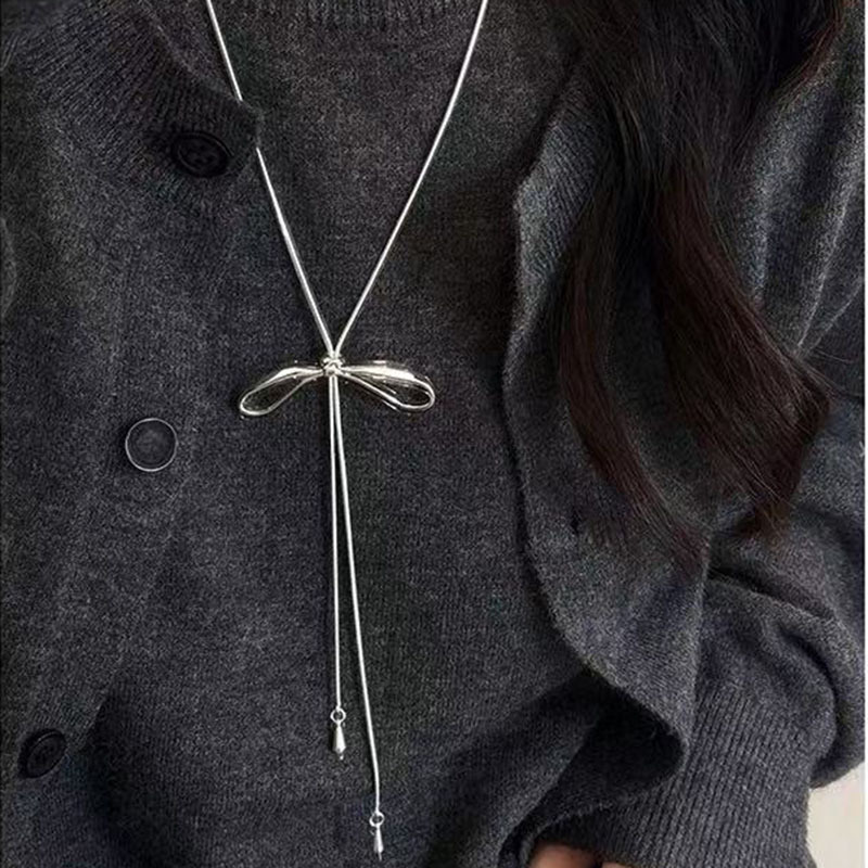 Round ring pendant necklace, black cord, long chain style