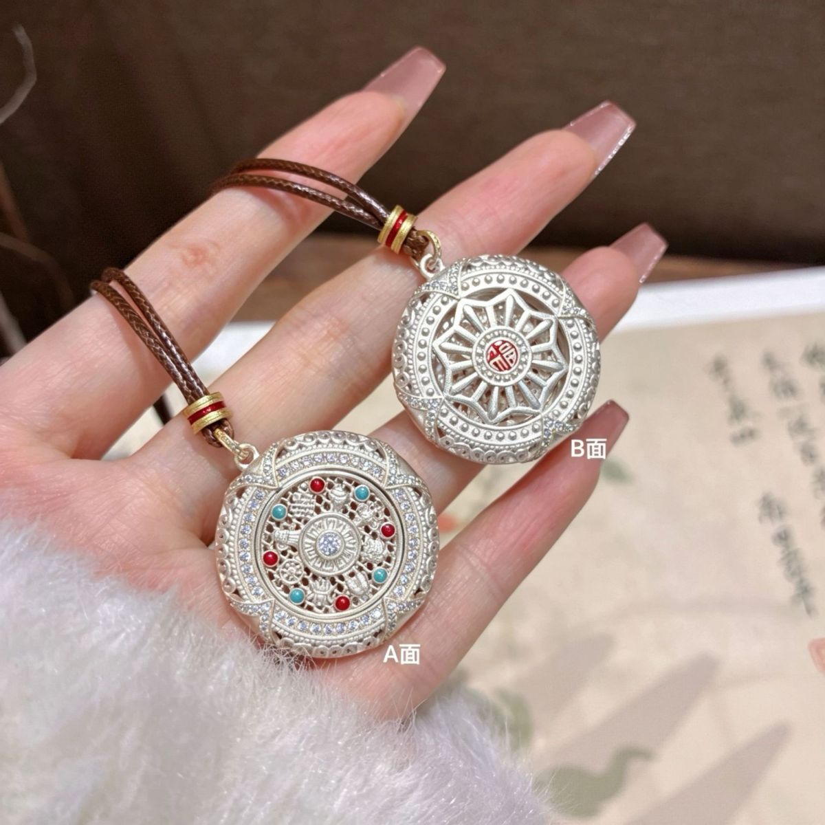 Silver rotatable Eight Treasures compass pendant, long sweater chain