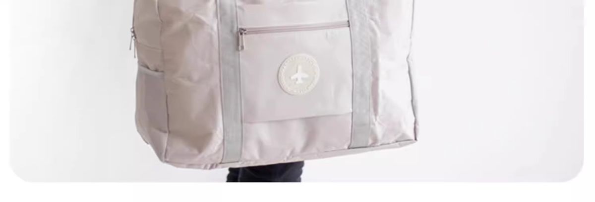 圆标飞机旅行收纳包加厚大容量衣服手提收纳袋旅游行李箱整理袋厂