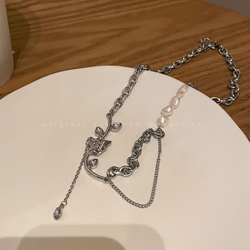 Pearl tassel necklace with petal design