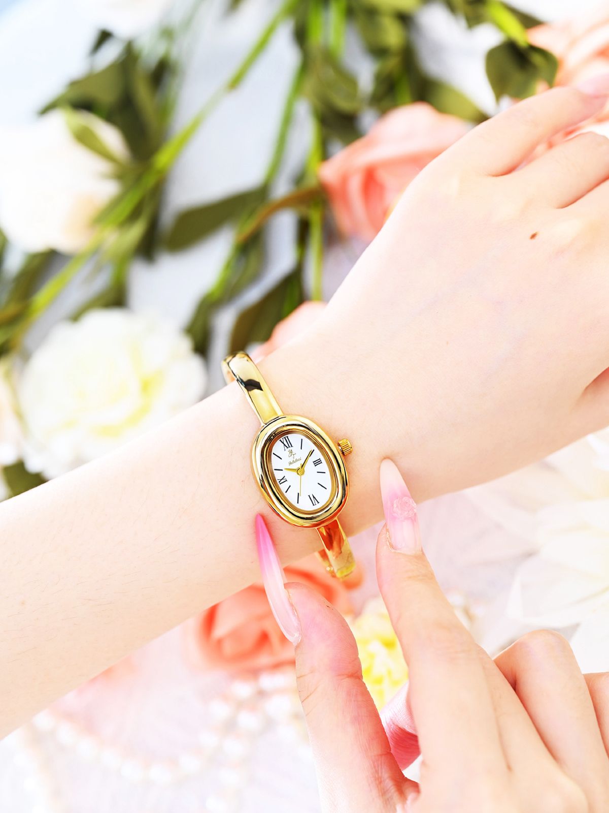 Yalalusi women's oval quartz wristwatch, gold