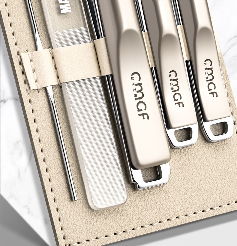 Nail clipper set with angled clipper and ear scoop