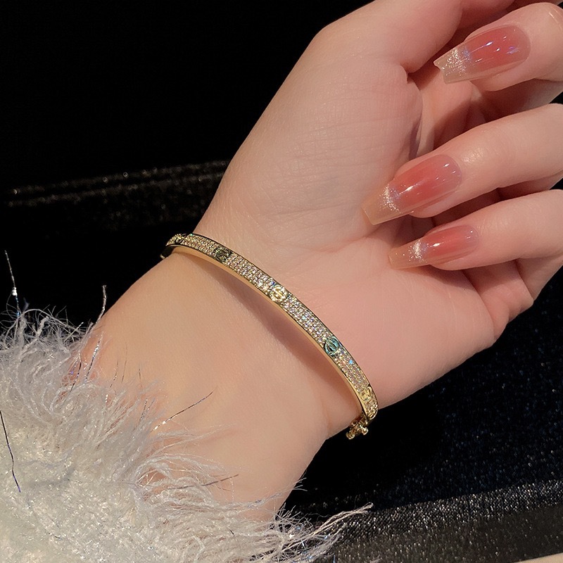 Wide round three-row crystal bracelet, metal snap clasp