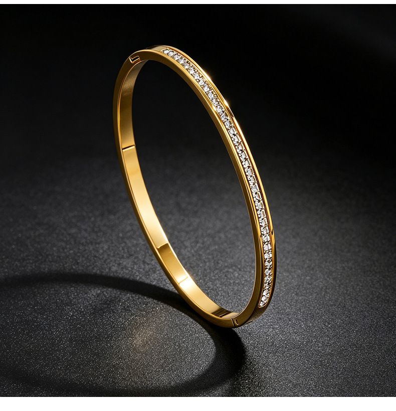 Titan-Stahl Armband, 18K vergoldet, 10 Steine mit Schiebeknoten