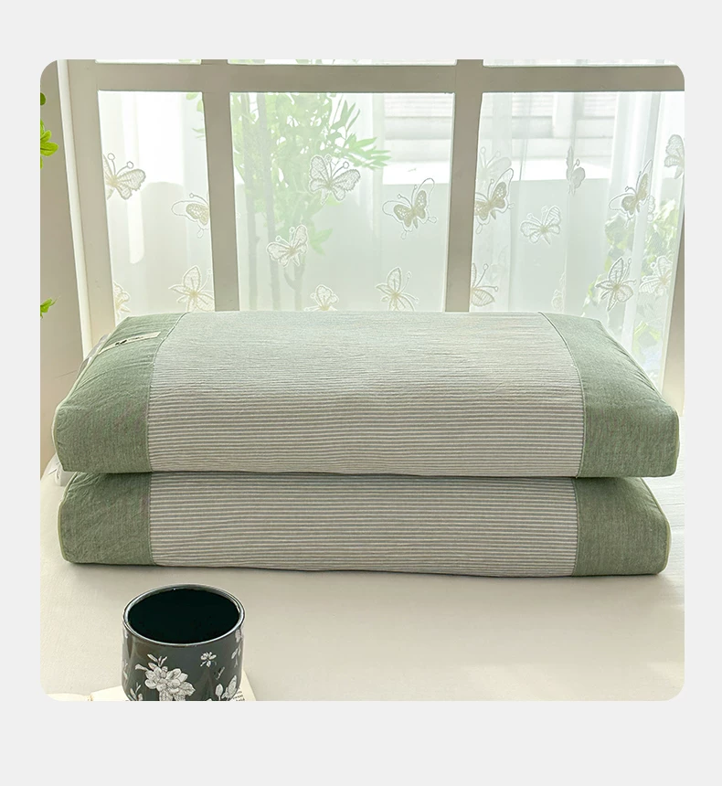 Cotton buckwheat hull pillow with cervical spine support