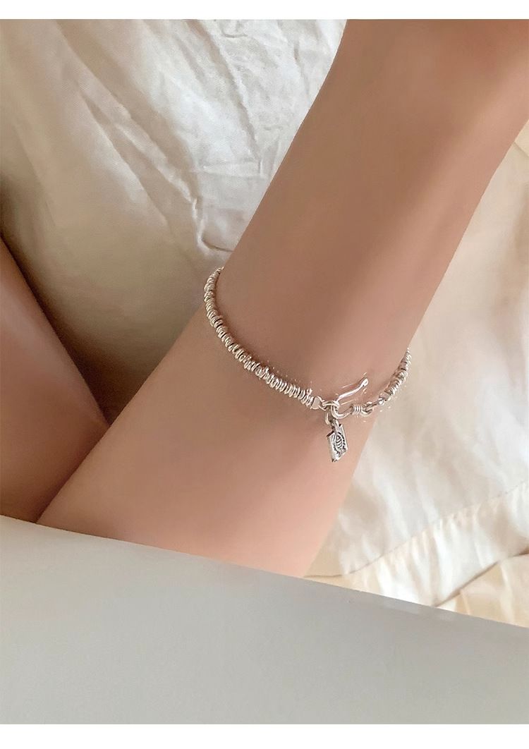 迈思卡通体足银999小鱼方牌手链女韩国高级小众设计复古盘缠手环