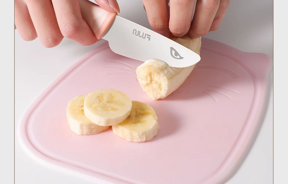 Children's safety fruit knife, unsharpened, with cutting board and tools