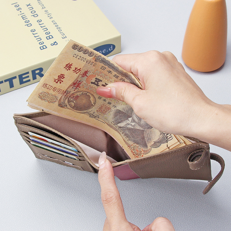 Dış ticaret yeni hakiki deri pasaport çantası, unisex, ultra ince RFID çok fonksiyonlu cüzdan, bilet tutucu, pasaport belge çantası.