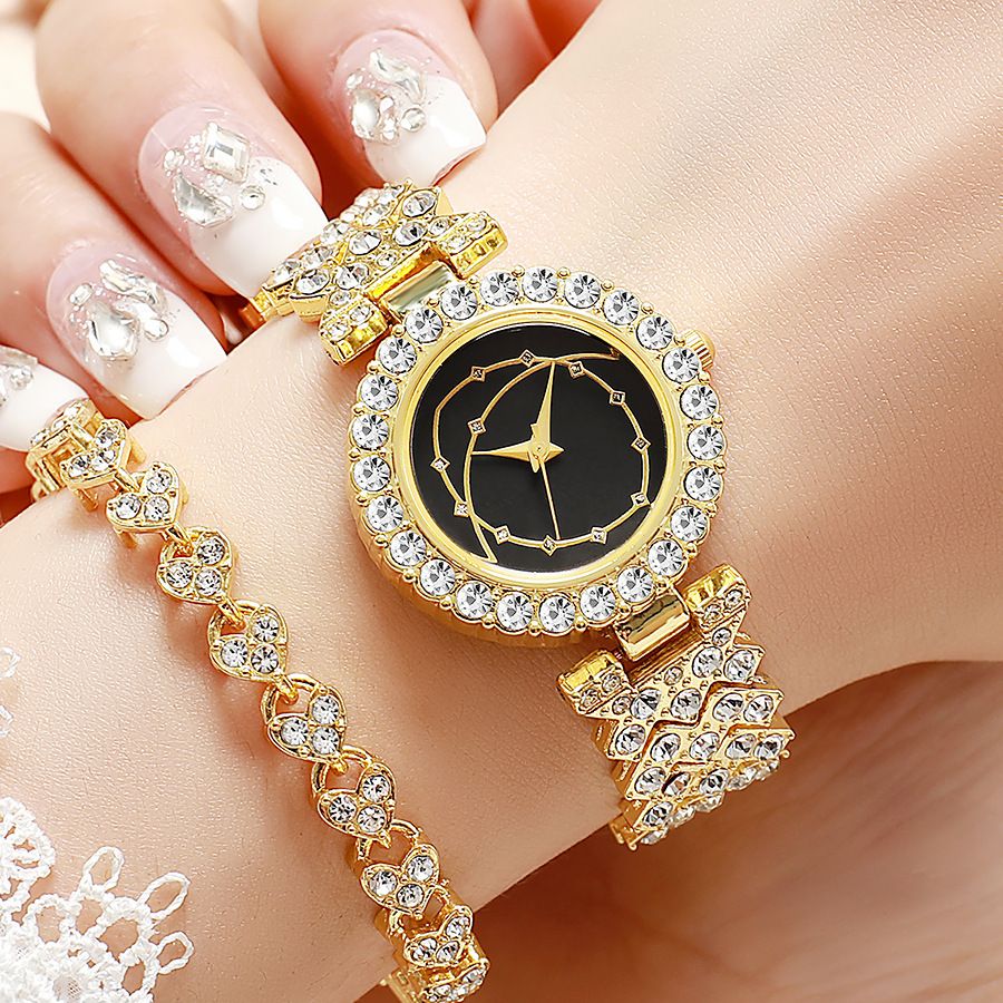 Women's quartz watch with rhinestone detail and Roman numerals
