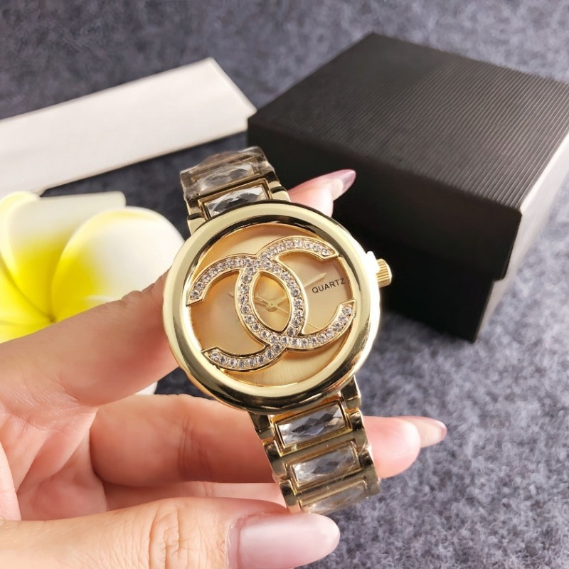 Women's quartz watch with stone accents, round open dial, pink