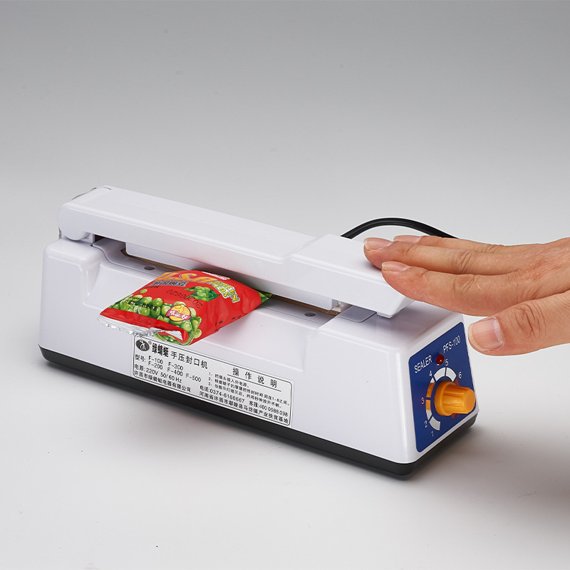 Hand-press plastic bag sealing machine