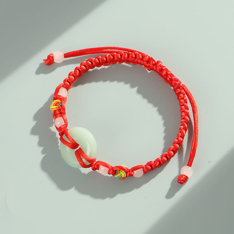 Red string bracelet, jade, safety clasp, hand-woven, unisex