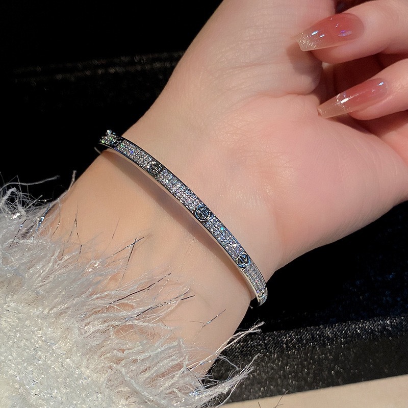 Wide round three-row crystal bracelet, metal snap clasp