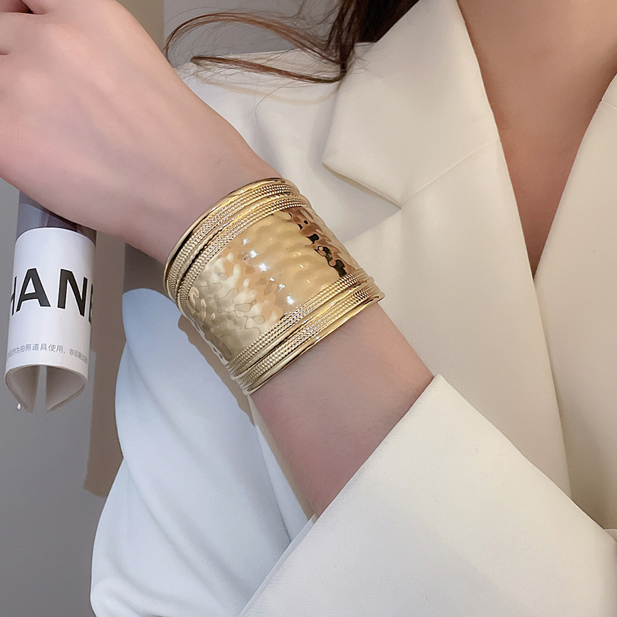 Metal geometric open bangle, gold tone