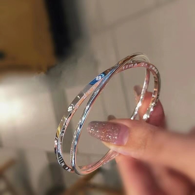 Four-leaf clover bracelet with double ring