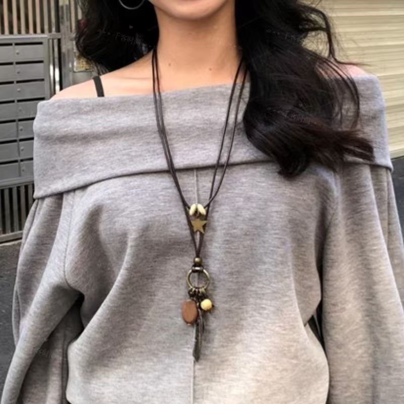 Round ring pendant necklace, black cord, long chain style