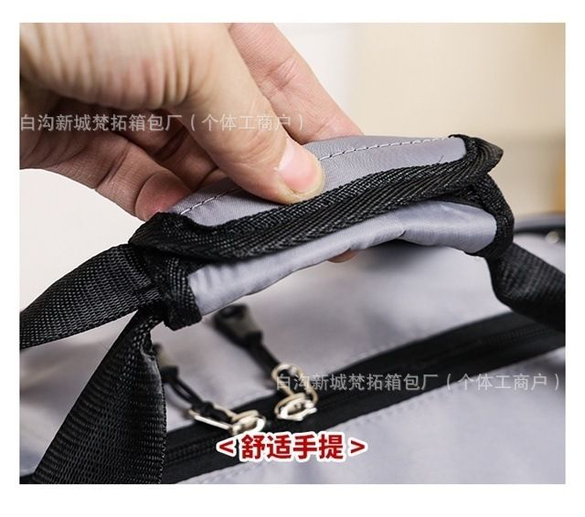 Large travel bag with handle, trolley case compatible, versatile