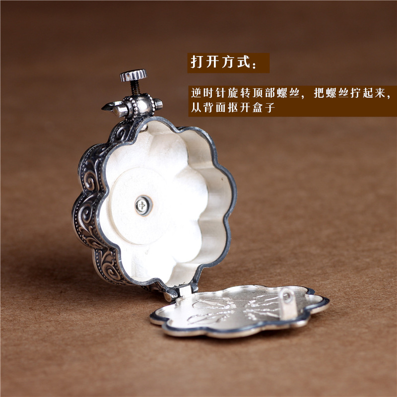 Silver lotus pendant with openable box, six character mantra design