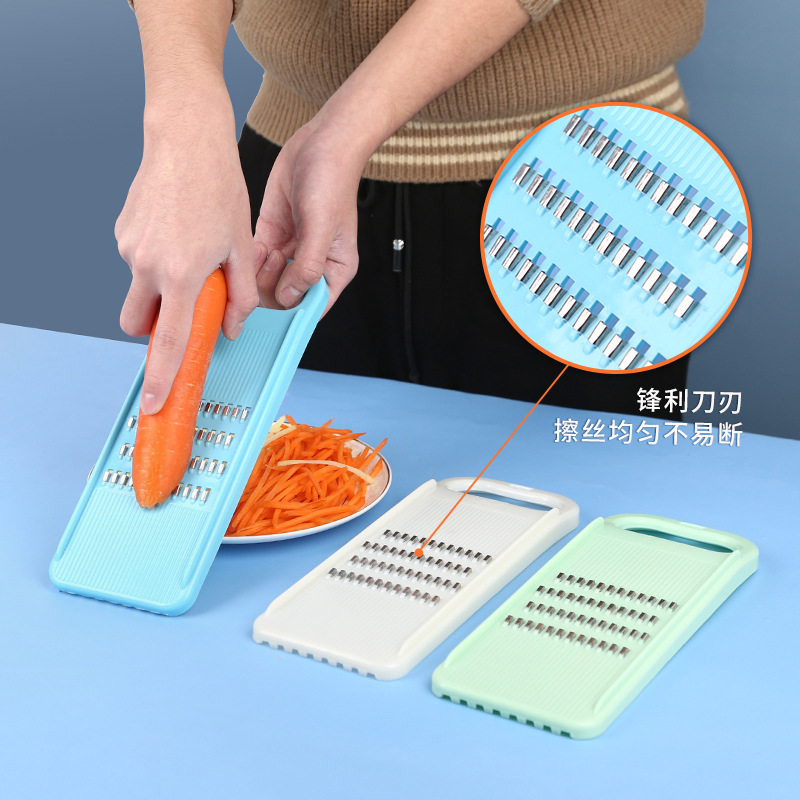 Vegetable slicer, potato shredder, carrot peeler, safe-grip design
