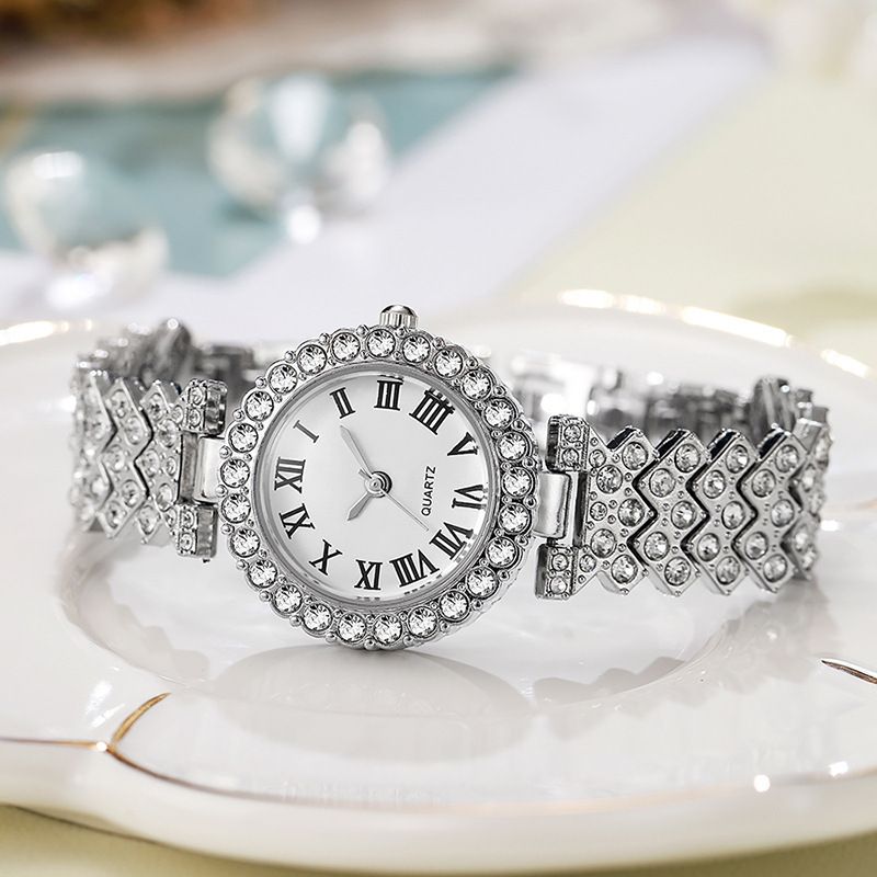 Women's quartz watch with rhinestone detail and Roman numerals