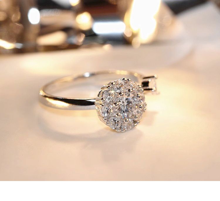 Rotating ring for women with rhinestones
