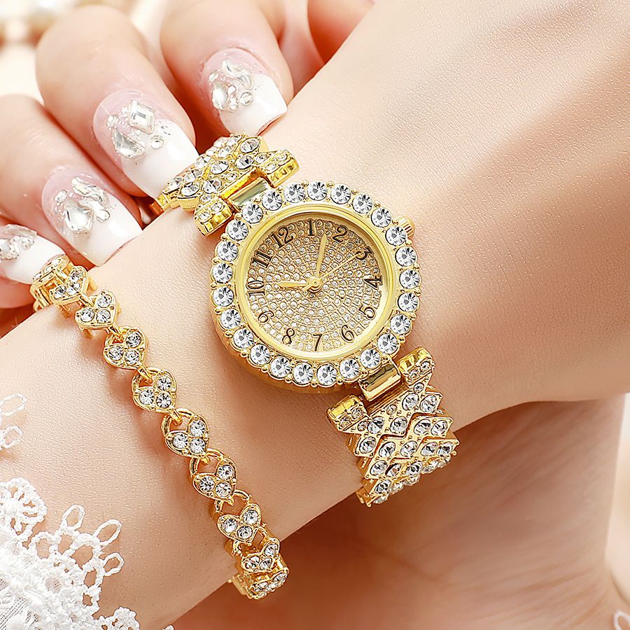 Women's quartz watch with rhinestone detail and Roman numerals