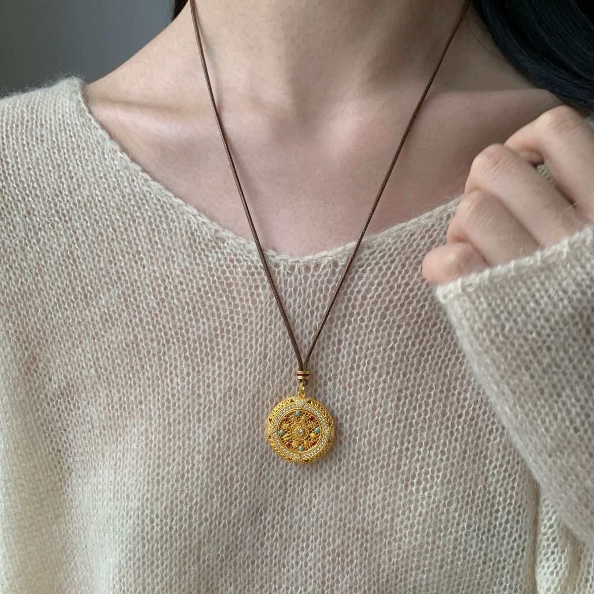 Silver rotatable Eight Treasures compass pendant, long sweater chain