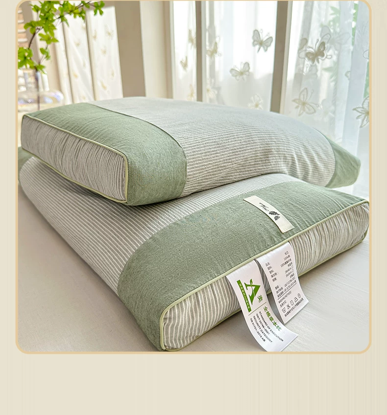 Cotton buckwheat hull pillow with cervical spine support