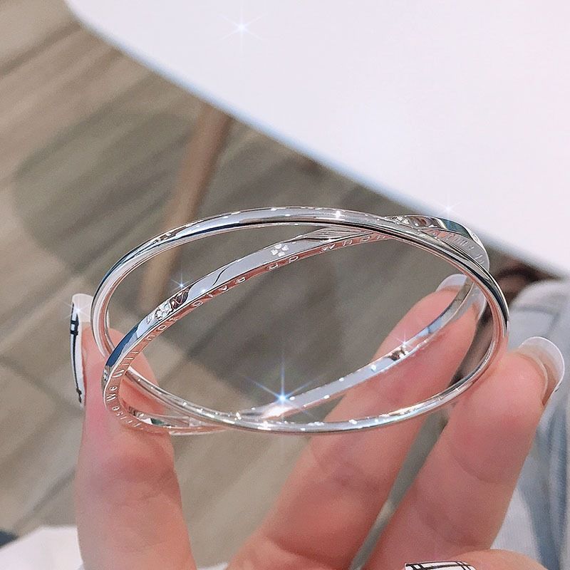 Four-leaf clover bracelet with double ring