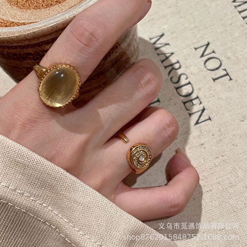 Gold egg-shaped gemstone stackable ring for women