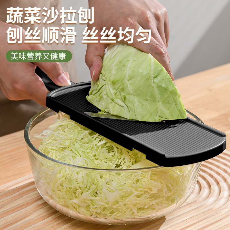 Cabbage shredder for vegetables and salads