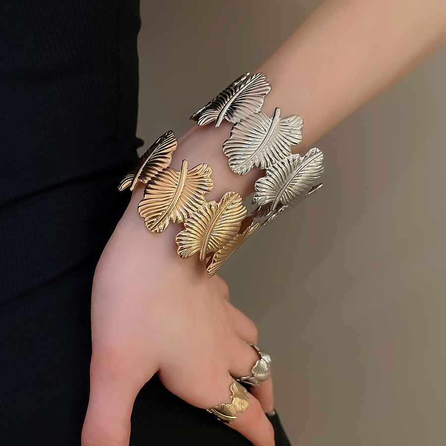 Metal geometric open bangle, gold tone