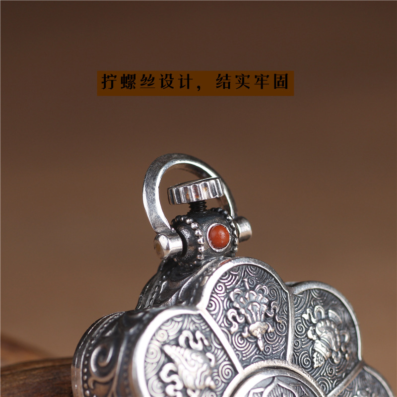 Silver lotus pendant with openable box, six character mantra design