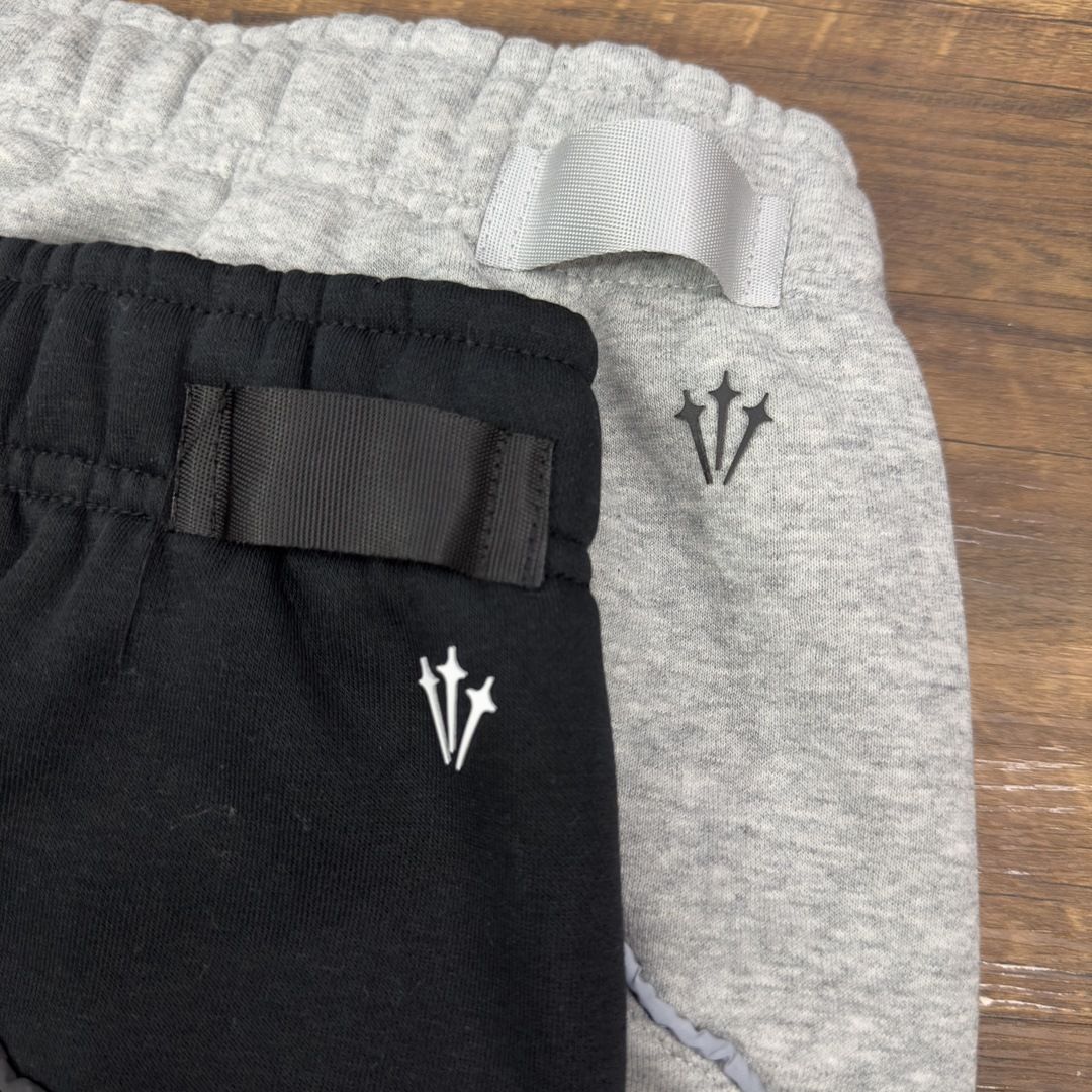Herren-Fleece-Trainingsanzug mit Weiten-Beinen und reflektierendem Streifen