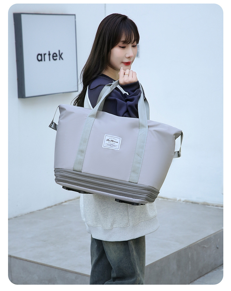 Four-layer expandable travel bag with wheels