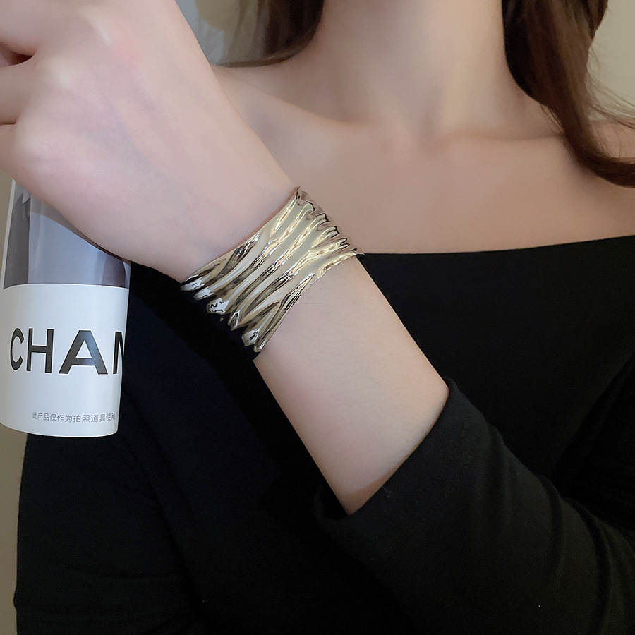 Metal geometric open bangle, gold tone