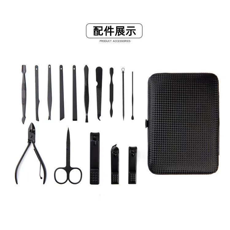 Black nail scissors set with nail clippers and manicure tools