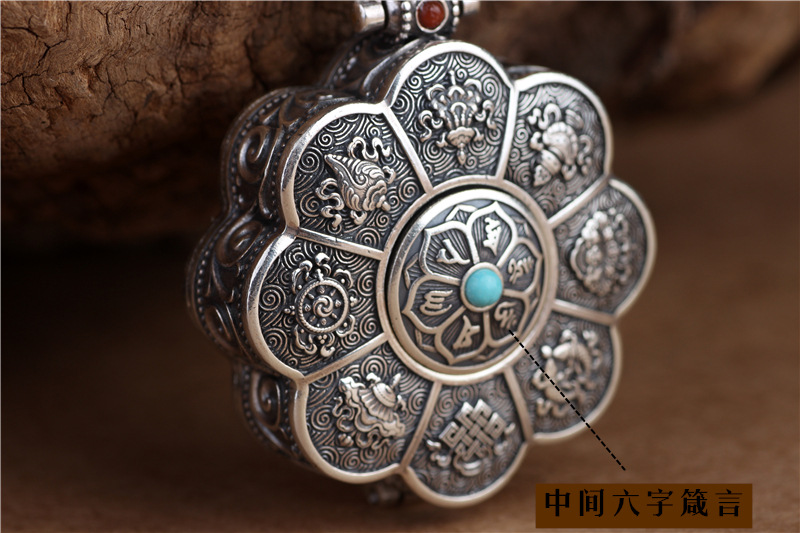 Silver lotus pendant with openable box, six character mantra design