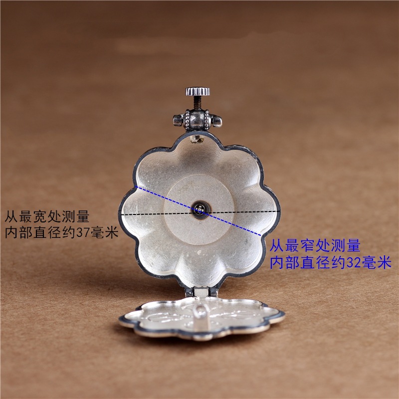 Silver lotus pendant with openable box, six character mantra design
