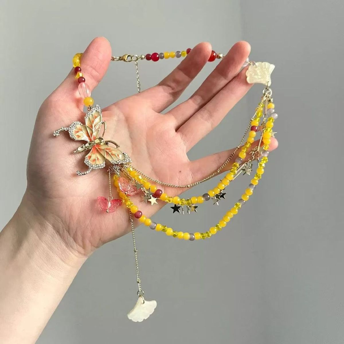 Mehrlagige Halskette mit Blütenquasten, Schlüsselbein-Kette