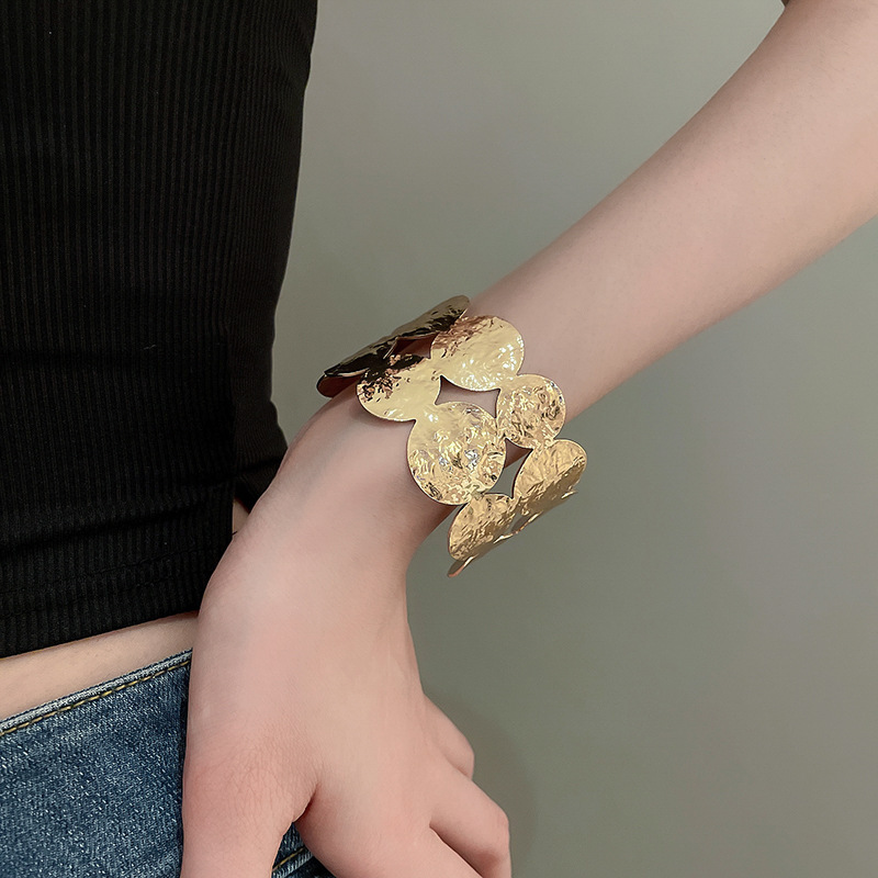 Metal geometric open bangle, gold tone