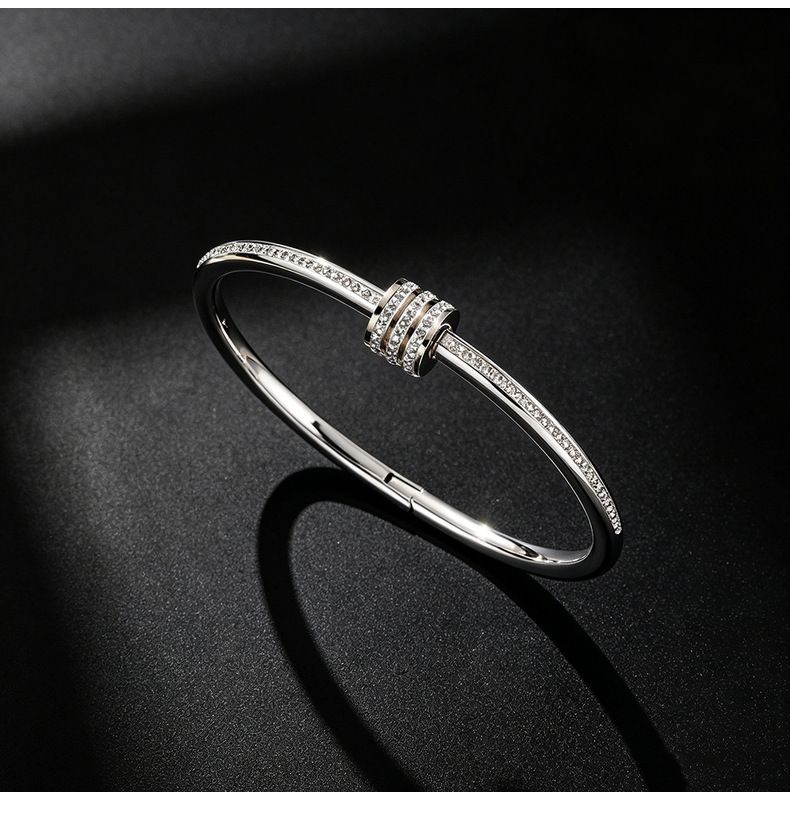 Titan-Stahl Armband, 18K vergoldet, 10 Steine mit Schiebeknoten