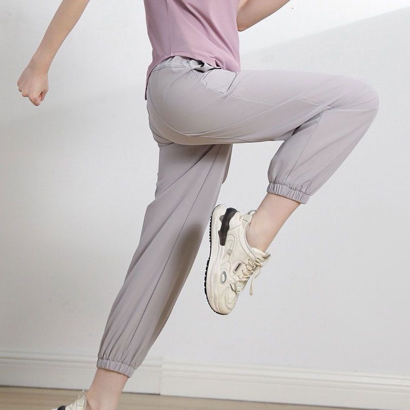 Yeni stil kadın bol paça jogger hızlı kuruyan yoga pantolonu dar kesim koşu fitness nefes alan günlük pantolon