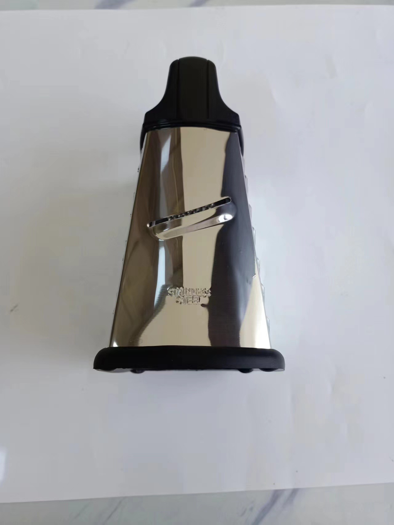 Multifunctional kitchen grater with handle and curved blade