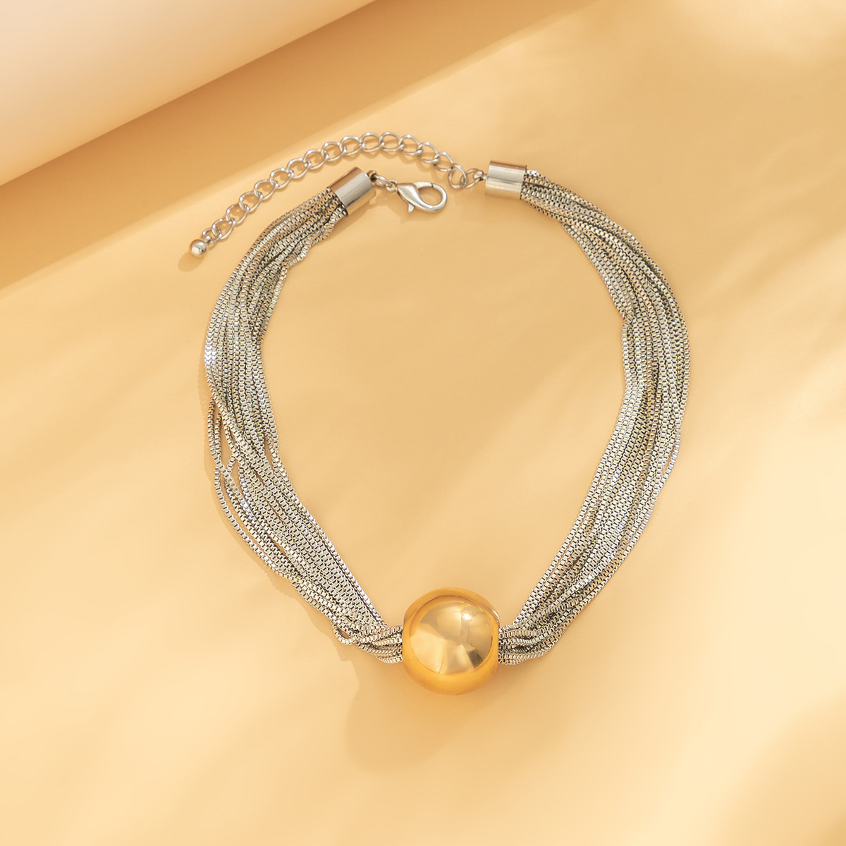 Multi-layer chain pendant necklace with spherical design