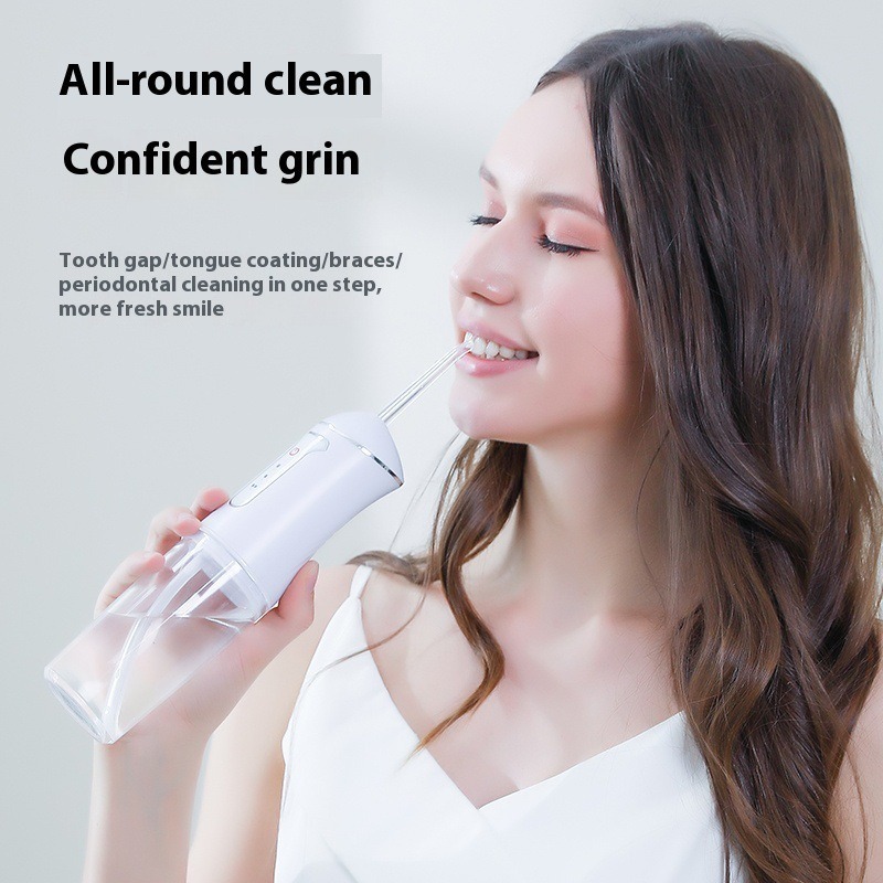 Electric dental cleaner, portable oral irrigator