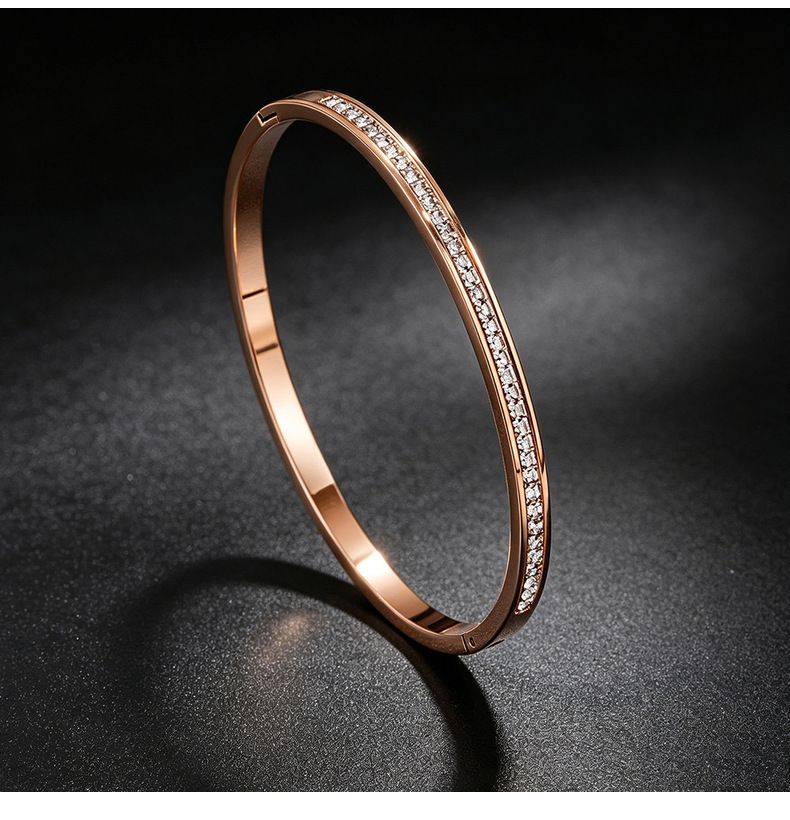 Titan-Stahl Armband, 18K vergoldet, 10 Steine mit Schiebeknoten