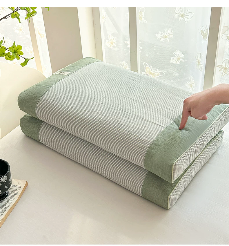 Cotton buckwheat hull pillow with cervical spine support