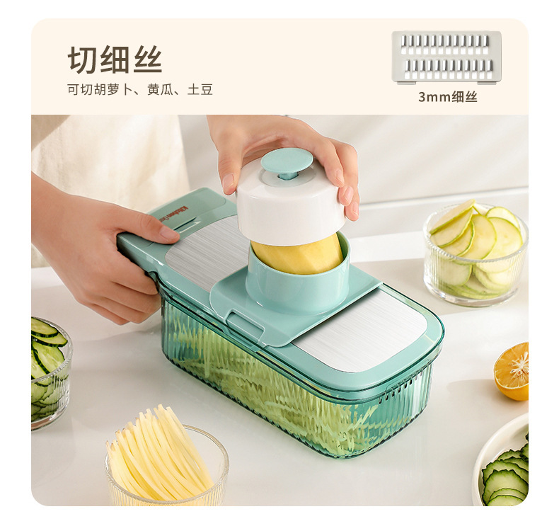 Vegetable cutter and grater with hand guard slicer function