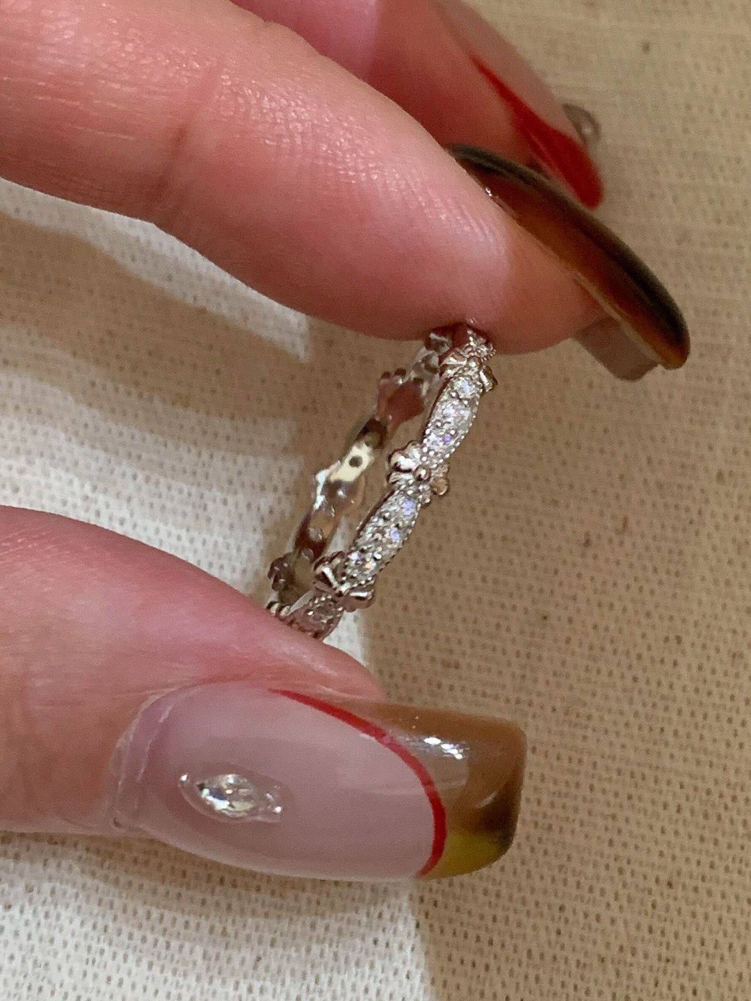 Lace iris rhinestone ring, adjustable, silver tone